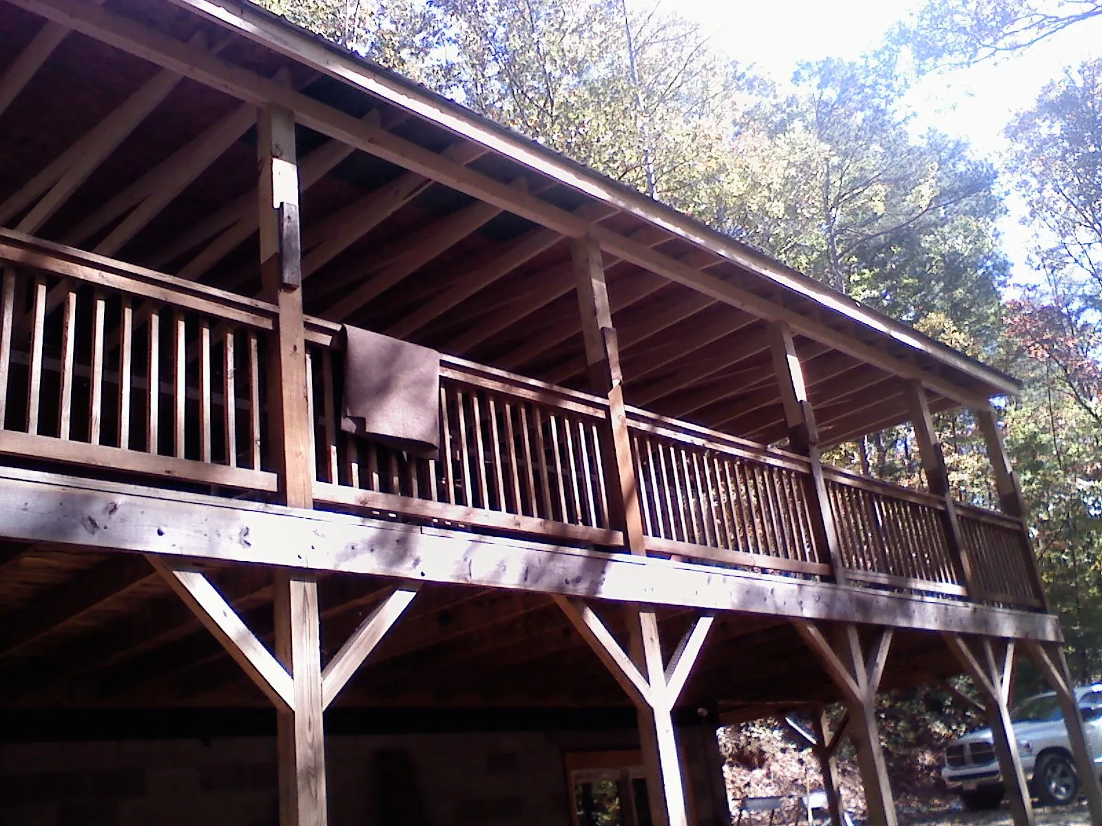 Timber framing under a new elevated porch and deck — Roof Leak Repair in Quinebaug by Roofing Brothers